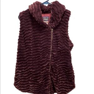 Dark purple, super soft and fuzzy vest. Like new!